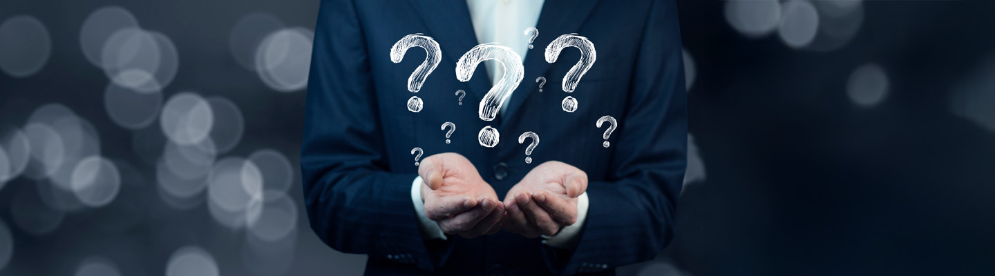 Businessman hand hold interface question marks