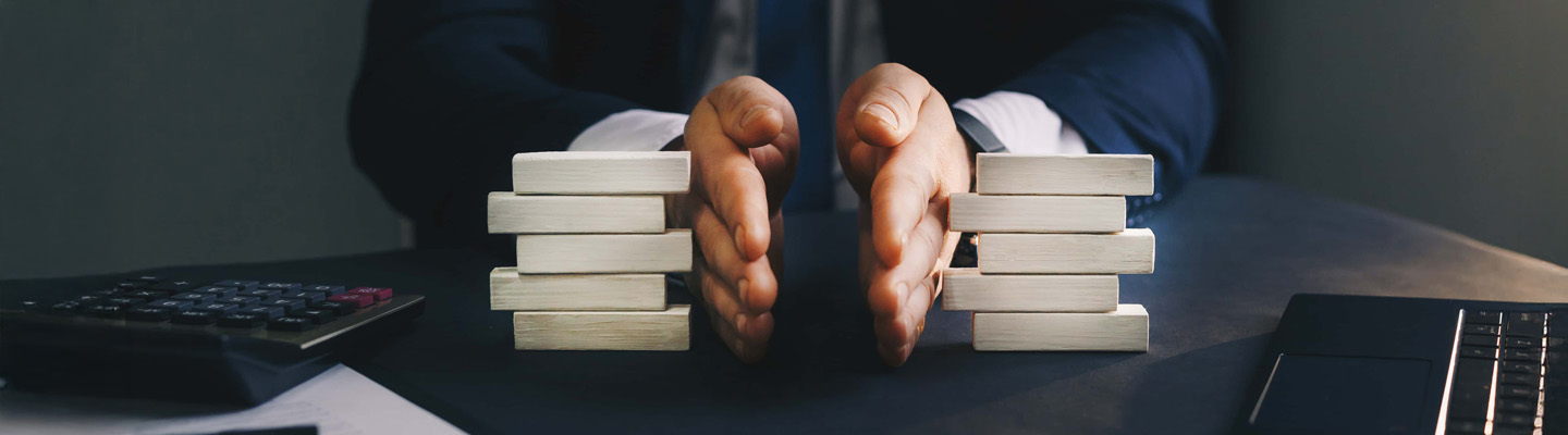 Businessman separates wooden block