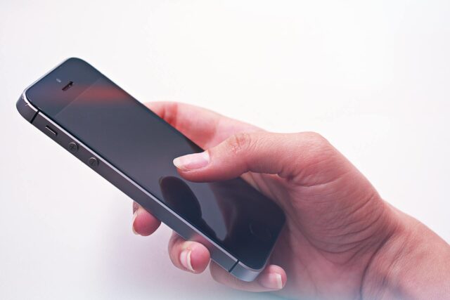 person holding cellphone